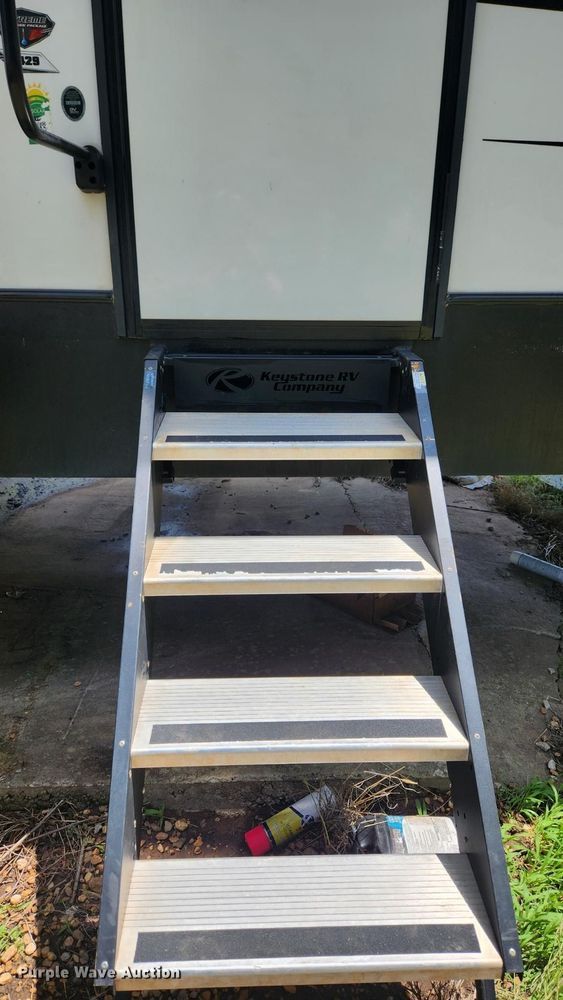 image for item DQ7055 2022 Keystone Raptor toy hauler camper