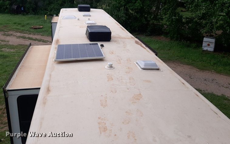 image for item DQ7055 2022 Keystone Raptor toy hauler camper