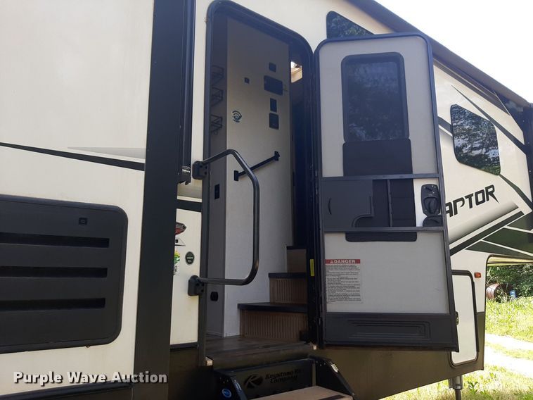 image for item DQ7055 2022 Keystone Raptor toy hauler camper