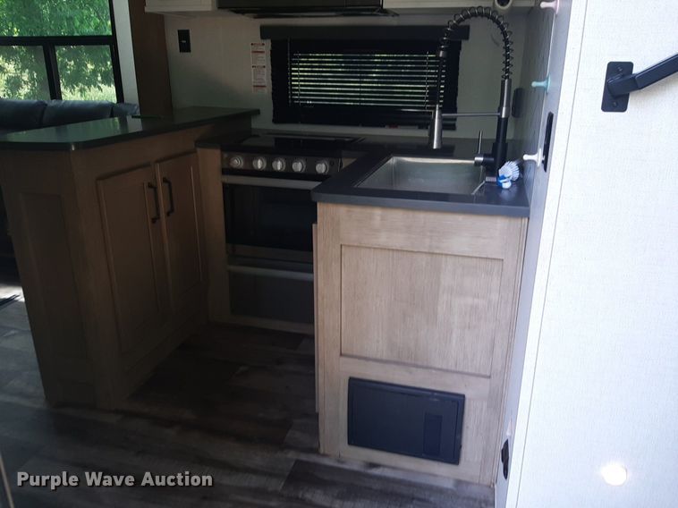 image for item DQ7055 2022 Keystone Raptor toy hauler camper