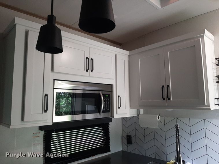 image for item DQ7055 2022 Keystone Raptor toy hauler camper