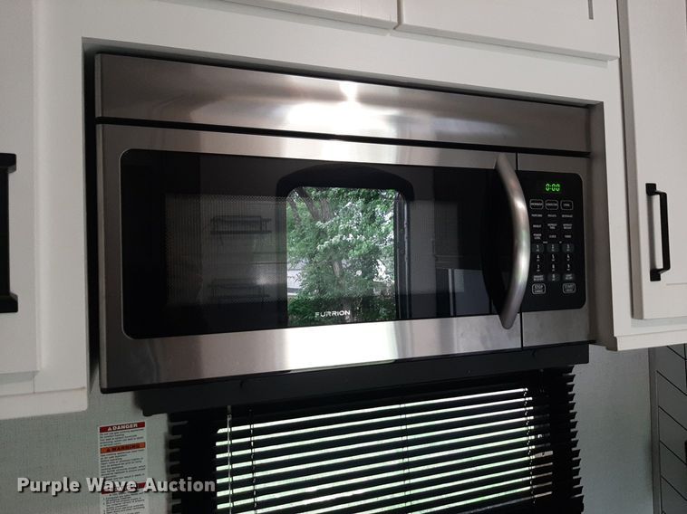 image for item DQ7055 2022 Keystone Raptor toy hauler camper