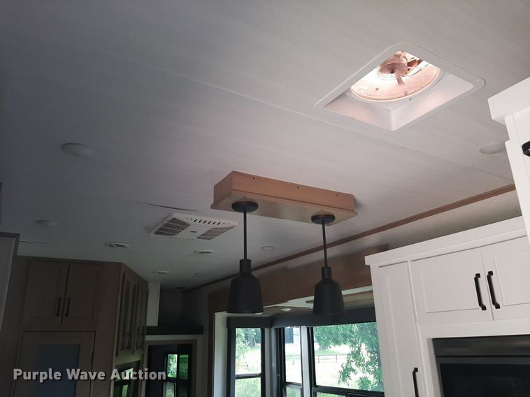 image for item DQ7055 2022 Keystone Raptor toy hauler camper