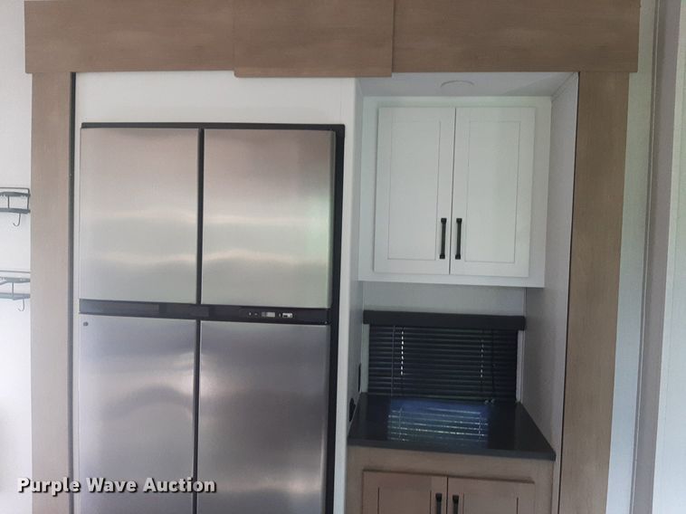 image for item DQ7055 2022 Keystone Raptor toy hauler camper