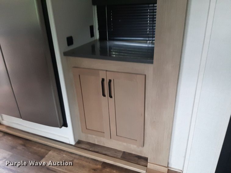 image for item DQ7055 2022 Keystone Raptor toy hauler camper