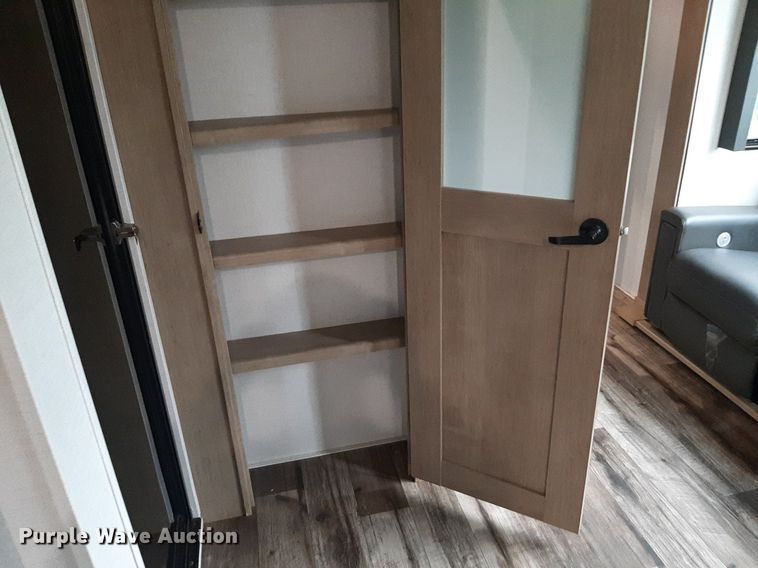 image for item DQ7055 2022 Keystone Raptor toy hauler camper