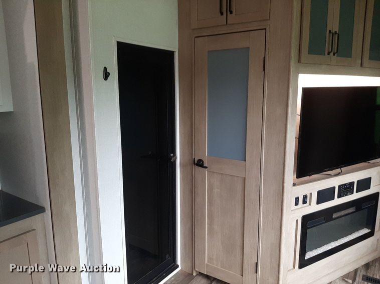 image for item DQ7055 2022 Keystone Raptor toy hauler camper