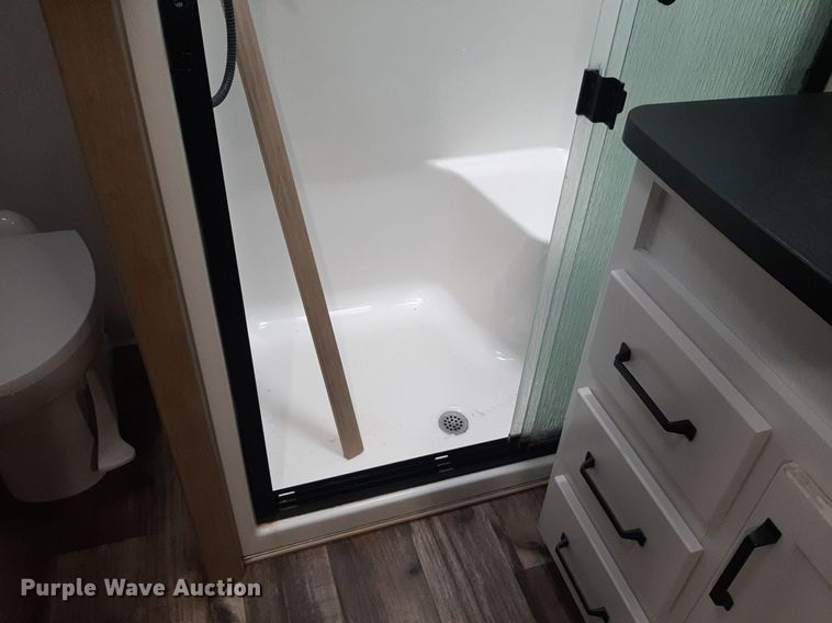 image for item DQ7055 2022 Keystone Raptor toy hauler camper