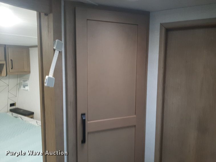 image for item DQ7055 2022 Keystone Raptor toy hauler camper