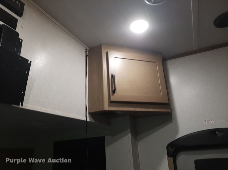 image for item DQ7055 2022 Keystone Raptor toy hauler camper