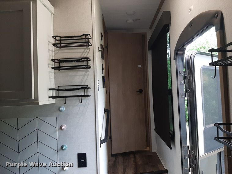 image for item DQ7055 2022 Keystone Raptor toy hauler camper