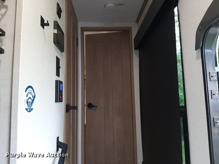 image for item DQ7055 2022 Keystone Raptor toy hauler camper