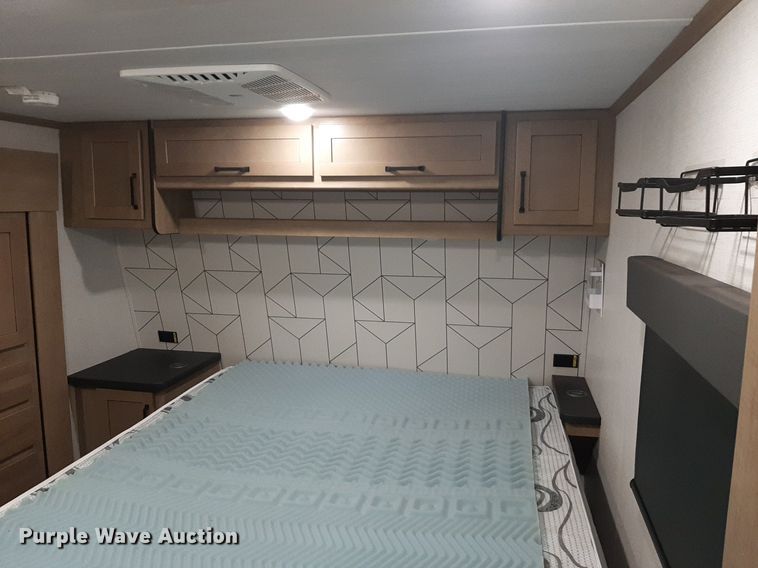 image for item DQ7055 2022 Keystone Raptor toy hauler camper