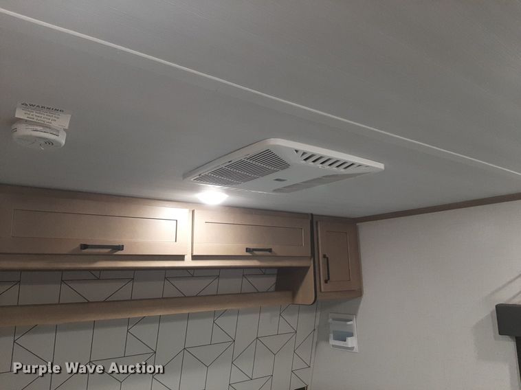 image for item DQ7055 2022 Keystone Raptor toy hauler camper