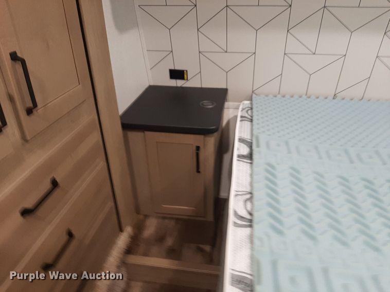 image for item DQ7055 2022 Keystone Raptor toy hauler camper