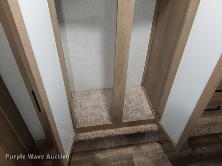 image for item DQ7055 2022 Keystone Raptor toy hauler camper