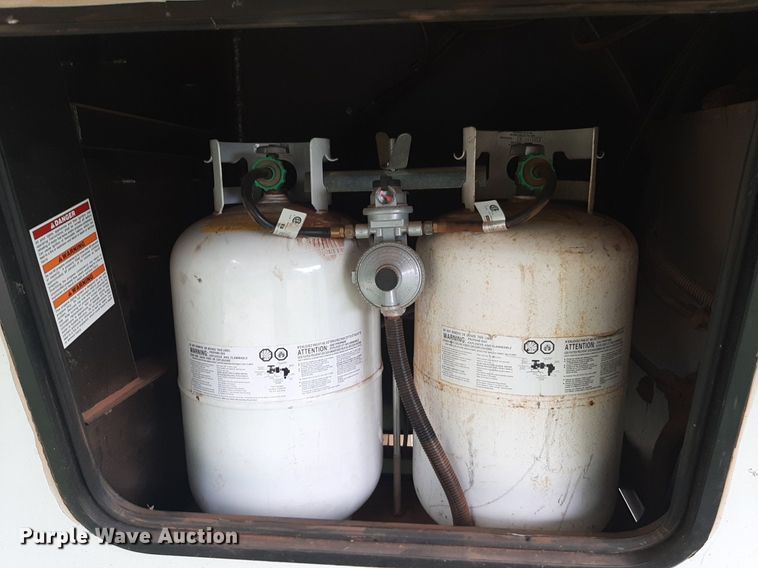 image for item DQ7055 2022 Keystone Raptor toy hauler camper