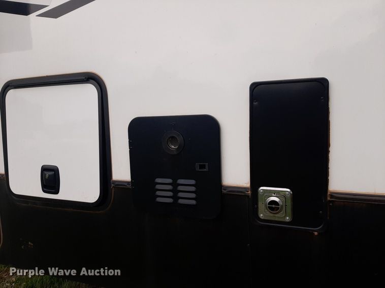 image for item DQ7055 2022 Keystone Raptor toy hauler camper