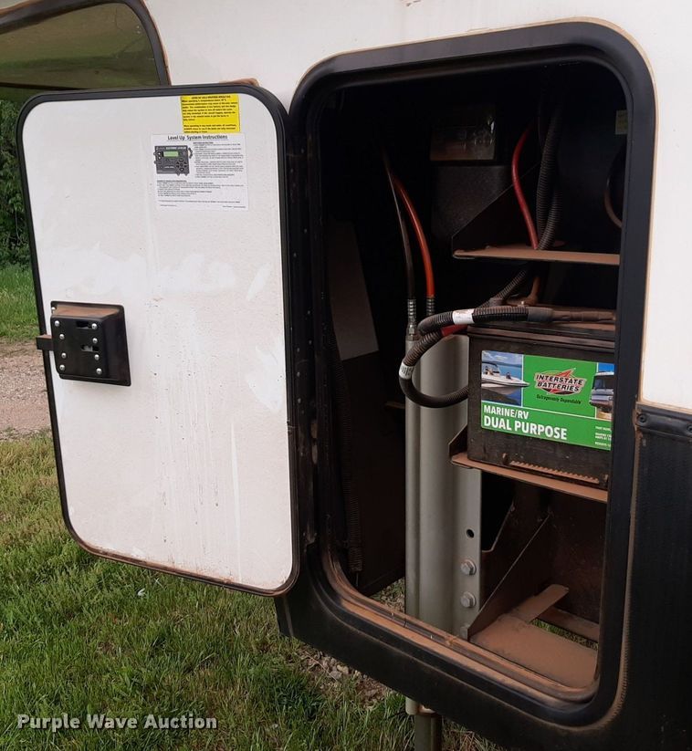 image for item DQ7055 2022 Keystone Raptor toy hauler camper