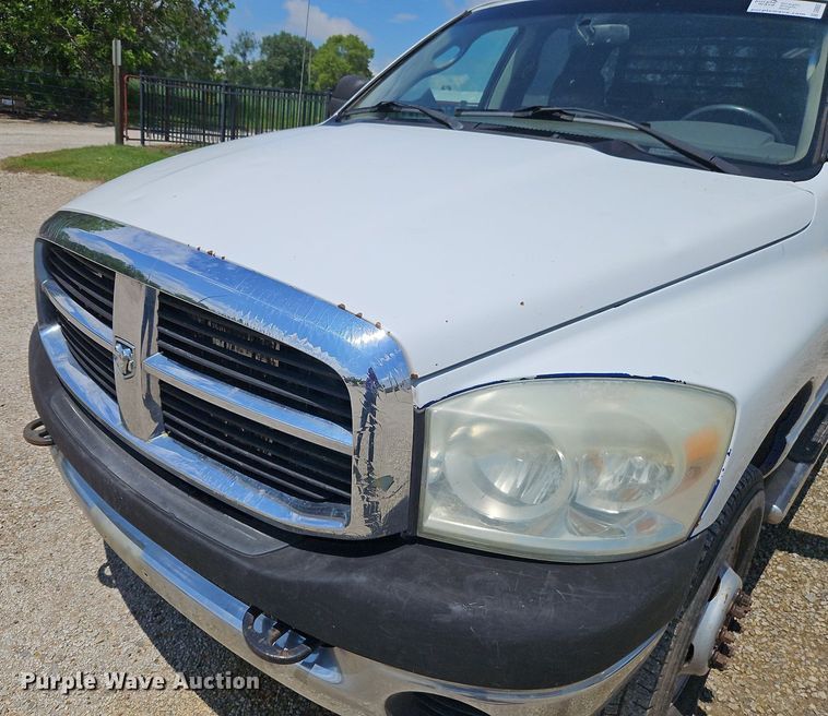 image for item DR8603 2007 Dodge Ram 3500HD Quad Cab flatbed pickup truck
