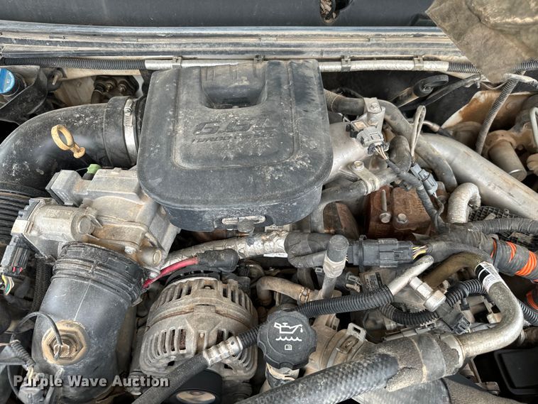 image for item IE9031 2012 Chevrolet  Silverado 3500HD Crew Cab flatbed pickup truck