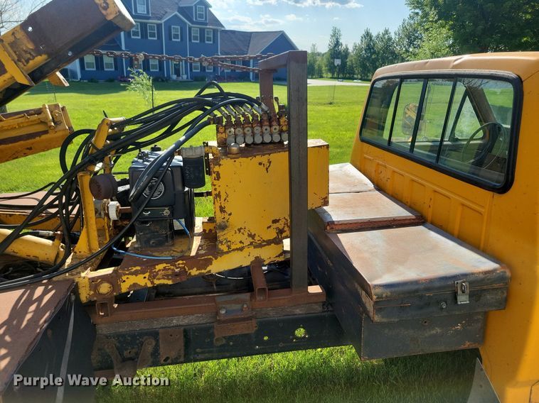 image for item KB9022 1985 Ford F350 pickup truck cab and chassis with tree spade