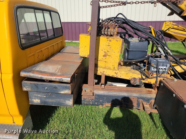 image for item KB9022 1985 Ford F350 pickup truck cab and chassis with tree spade