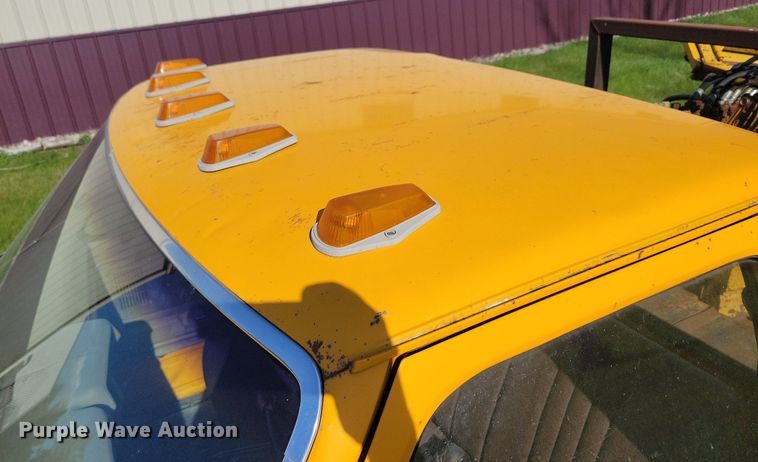 image for item KB9022 1985 Ford F350 pickup truck cab and chassis with tree spade