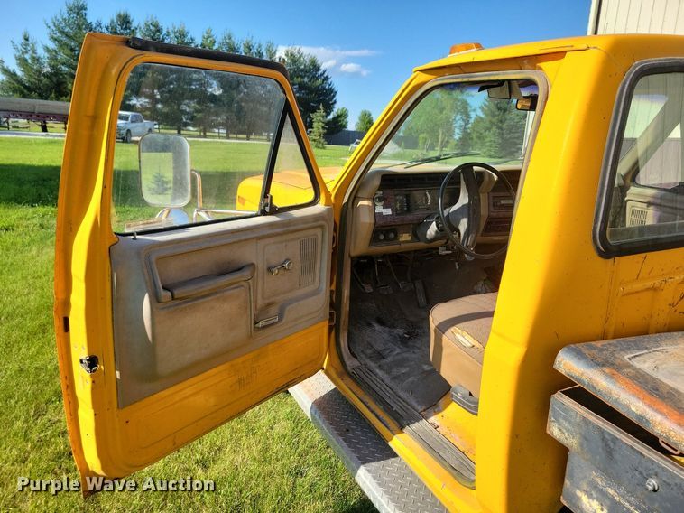 image for item KB9022 1985 Ford F350 pickup truck cab and chassis with tree spade