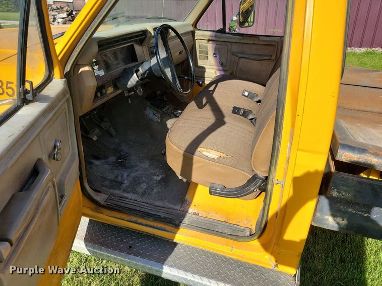 image for item KB9022 1985 Ford F350 pickup truck cab and chassis with tree spade