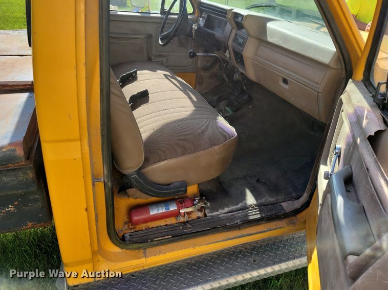 image for item KB9022 1985 Ford F350 pickup truck cab and chassis with tree spade