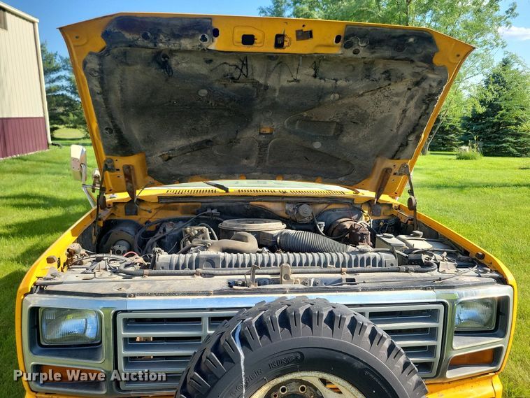 image for item KB9022 1985 Ford F350 pickup truck cab and chassis with tree spade