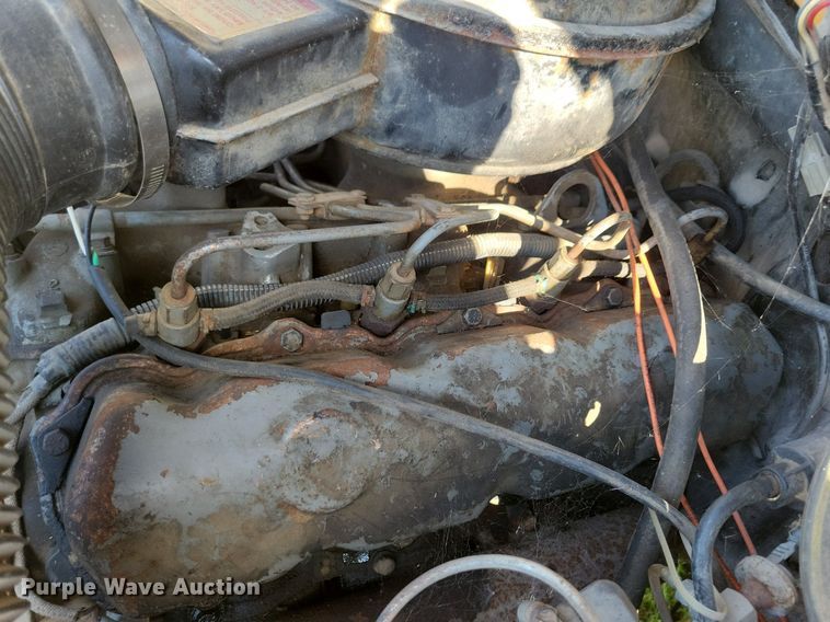 image for item KB9022 1985 Ford F350 pickup truck cab and chassis with tree spade