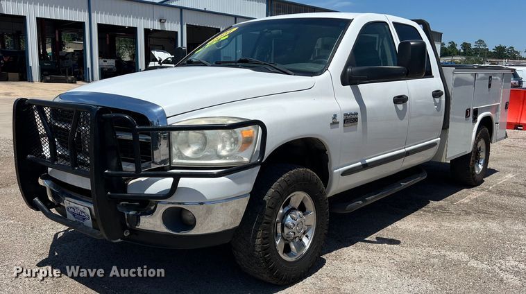 image for item LU9854 2007 Dodge Ram 2500HD Quad Cab utility bed pickup truck