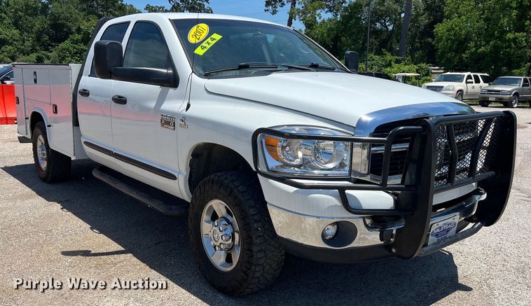 image for item LU9854 2007 Dodge Ram 2500HD Quad Cab utility bed pickup truck