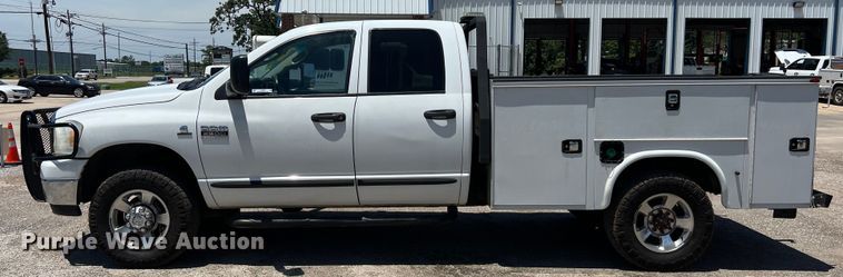 image for item LU9854 2007 Dodge Ram 2500HD Quad Cab utility bed pickup truck