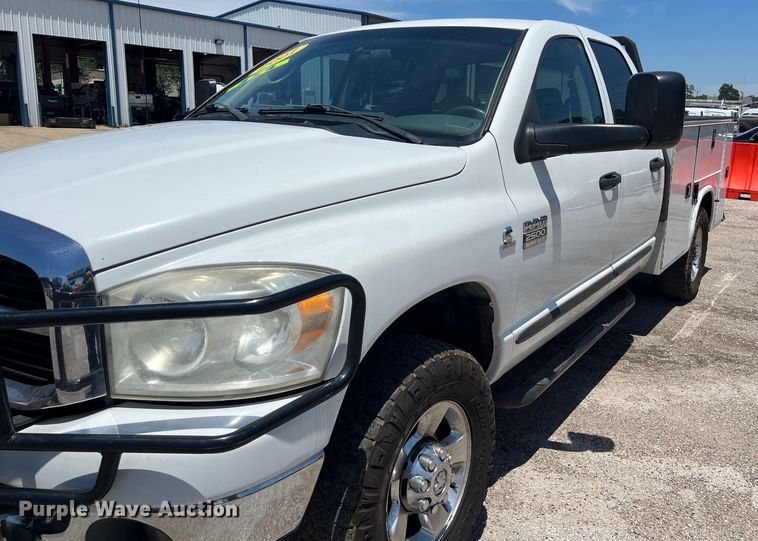 image for item LU9854 2007 Dodge Ram 2500HD Quad Cab utility bed pickup truck