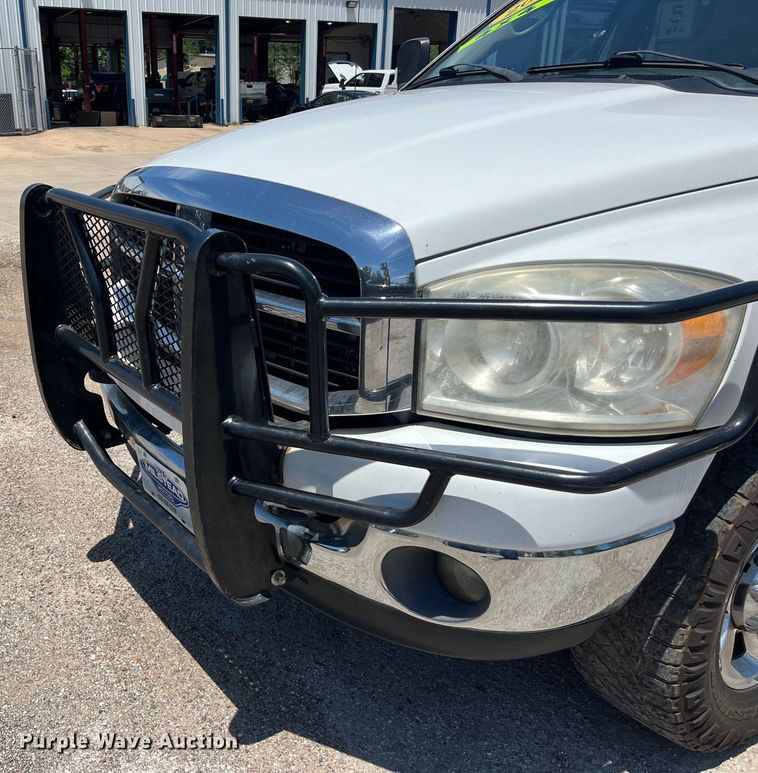 image for item LU9854 2007 Dodge Ram 2500HD Quad Cab utility bed pickup truck