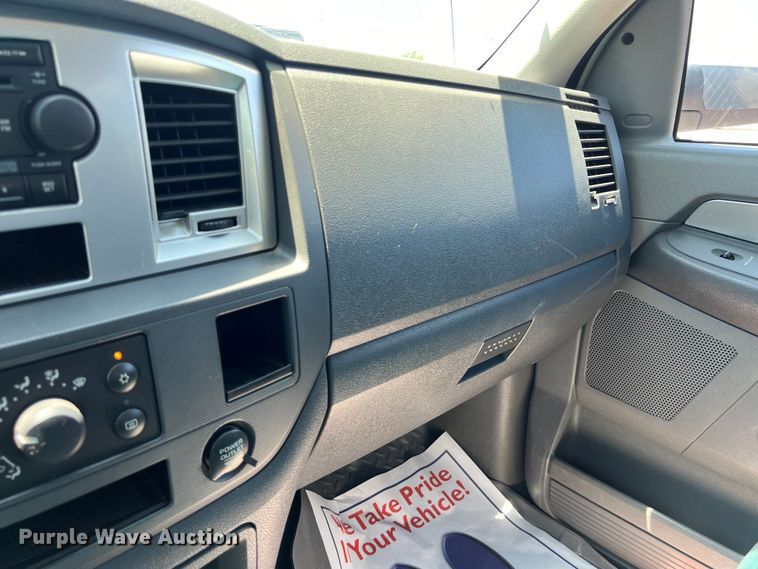 image for item LU9854 2007 Dodge Ram 2500HD Quad Cab utility bed pickup truck