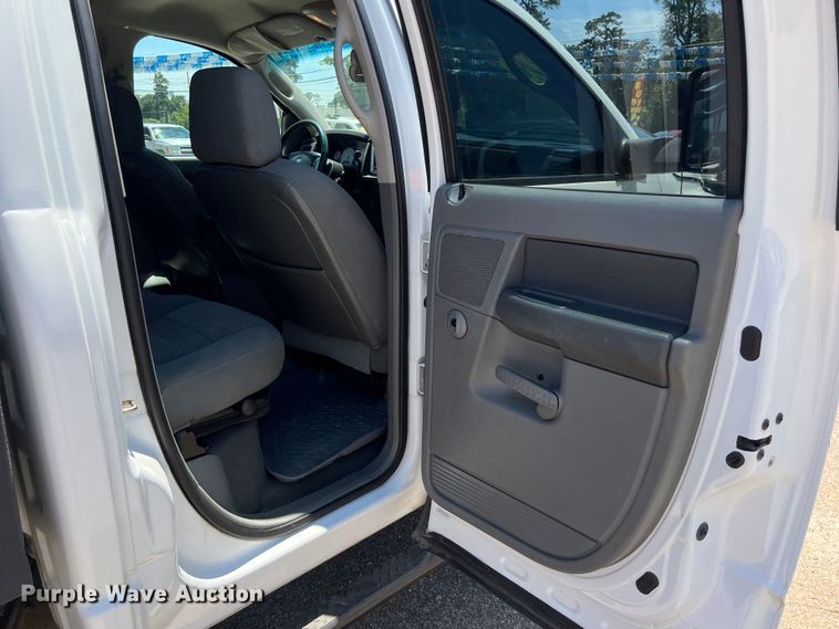 image for item LU9854 2007 Dodge Ram 2500HD Quad Cab utility bed pickup truck