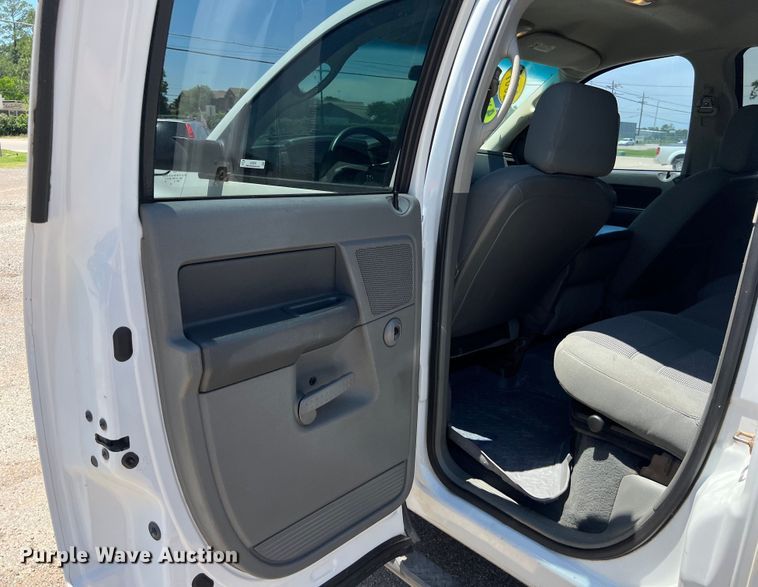 image for item LU9854 2007 Dodge Ram 2500HD Quad Cab utility bed pickup truck