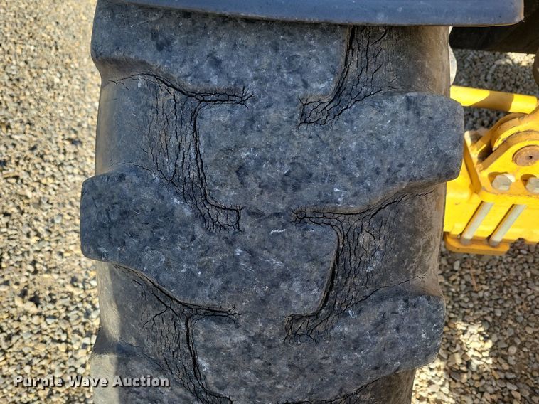 image for item DG0633 1997 Caterpillar TH63 telehandler