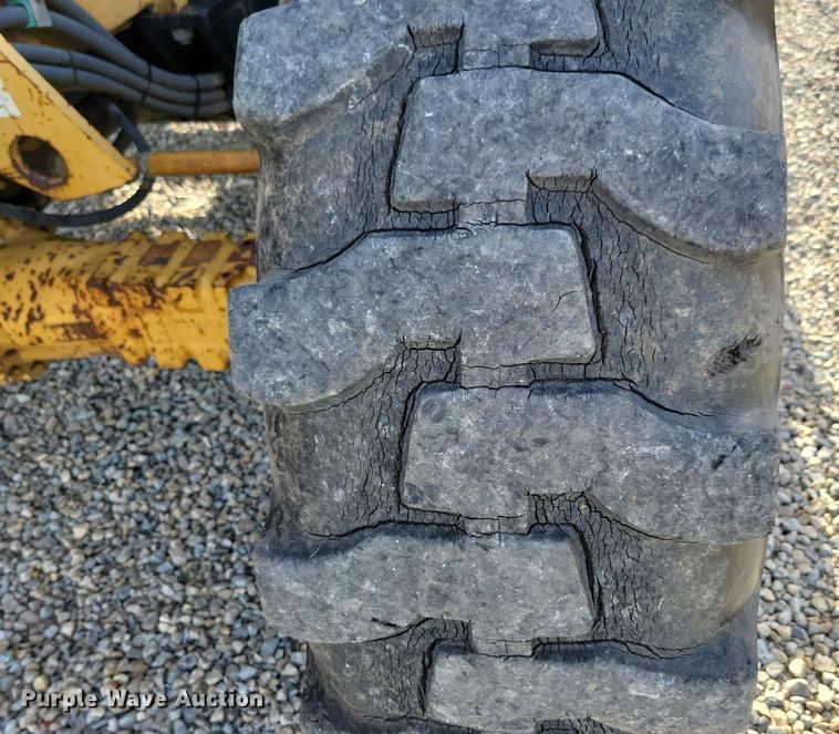 image for item DG0633 1997 Caterpillar TH63 telehandler