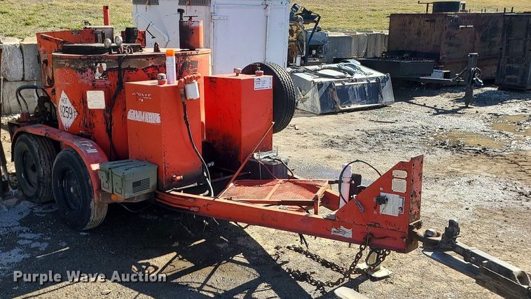 image for item DS7286 Crafco E-Z Pour pothole patcher