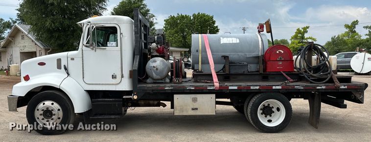 image for item DW5001 2001 Peterbilt 330 flatbed truck