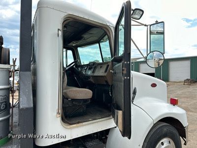 image for item DW5001 2001 Peterbilt 330 flatbed truck