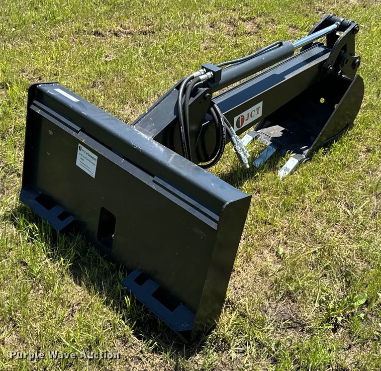 image for item DX0505 JCT skid steer backhoe