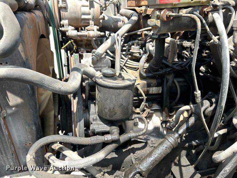 image for item EK4657 1998 Ford F700 flatbed truck