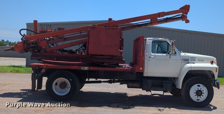 image for item NG9804 1993 Ford F700 pressure digger truck
