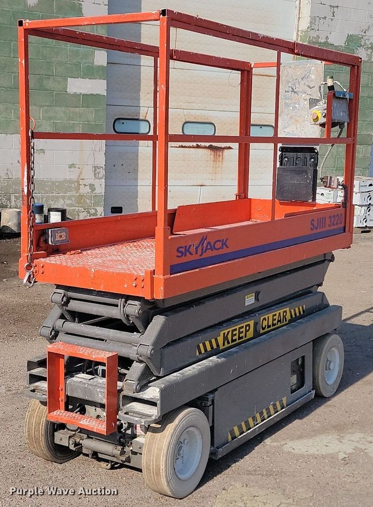image for item NZ9888 1999 Skyjack SJIII 3220 scissor lift